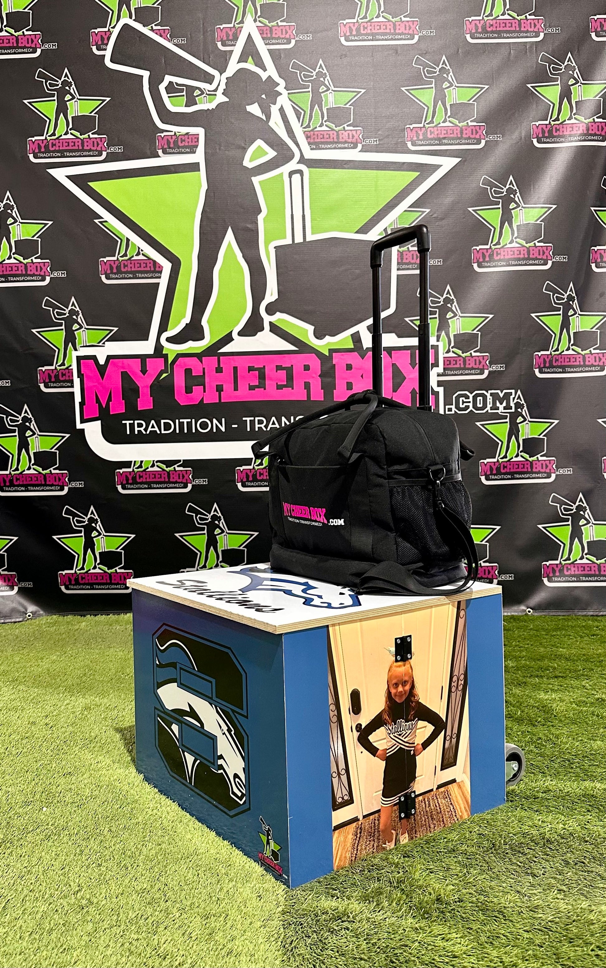 Youth Size Elite Box (Customizable) | One SideYouth Size Elite Box (Customizable)
Youth Size Elite Cheer Box – Comes with customizable exterior design and every accessory offered by My Cheer Box. (Cheer bag sold separately) MCB Cheer Box Bag – My